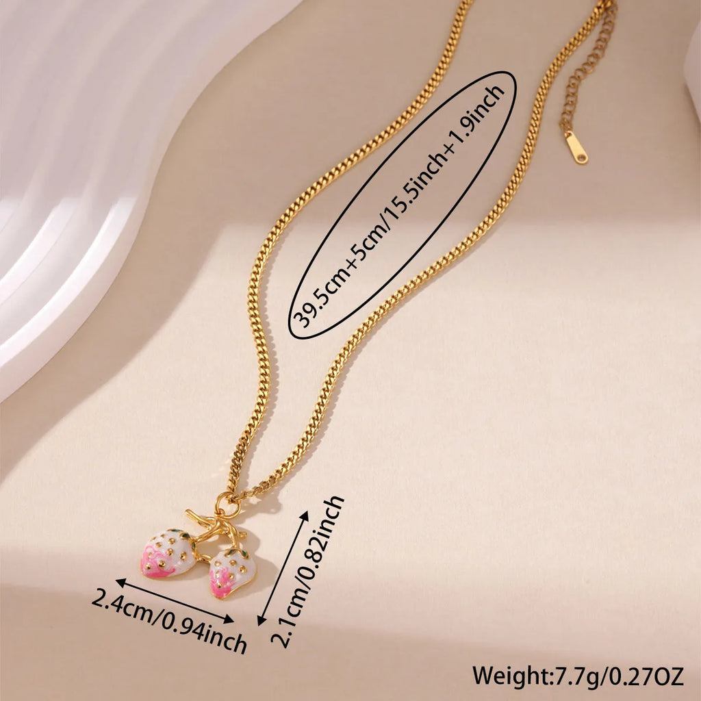 Stainless steel strawberry pendant necklace on adjustable alloy chain in red and white gradient colour options