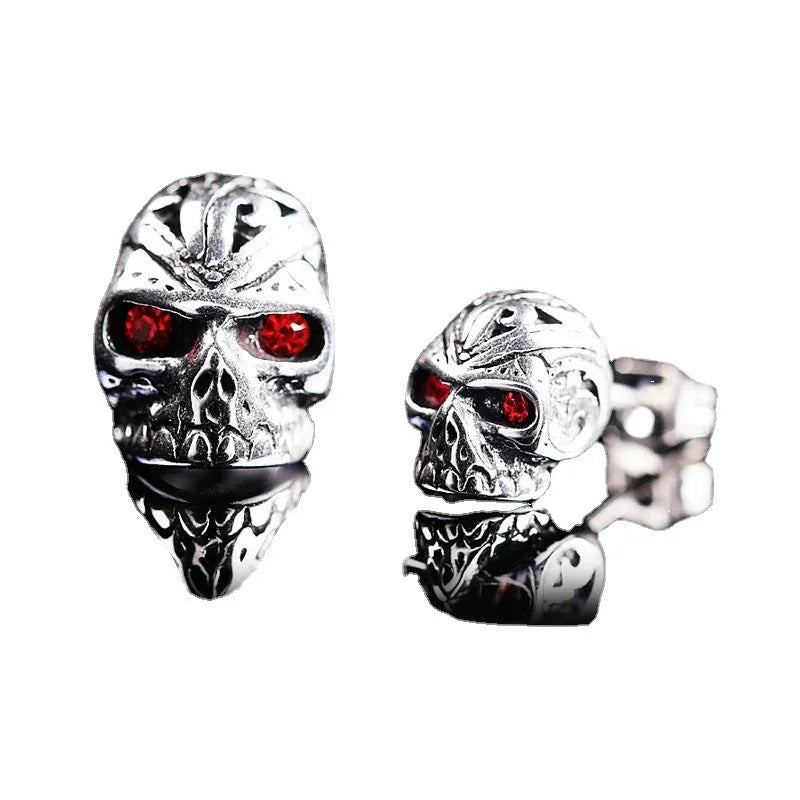 Retro red eye ghost head skull stud earrings with alloy gemstone inlay for women and unisex wear.