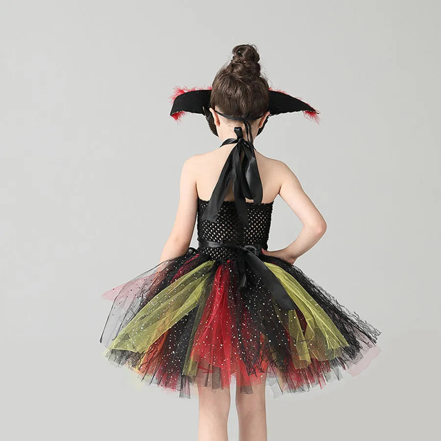 Girl's sleeveless pirate costume dress with sequins, lace, and mesh detailing, shown with an optional hat and eye mask.