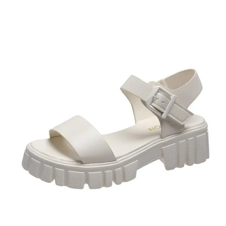 Beige women's peep toe platform sandals with an ankle-strap buckle on a white background.