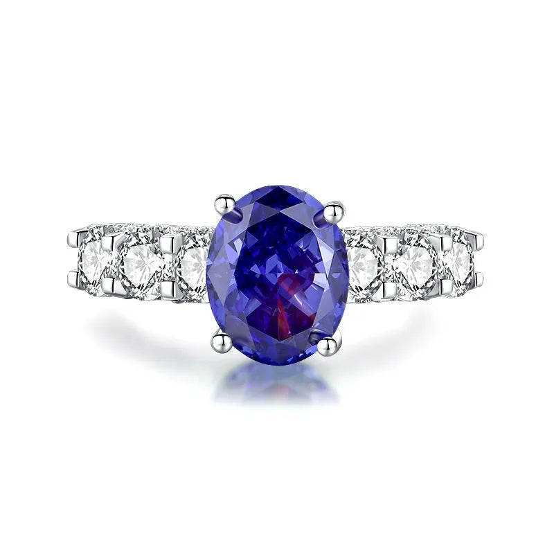 Heart-shaped sterling silver ring with a faceted ice flower cut zircon stone in a Tanzanite colour.