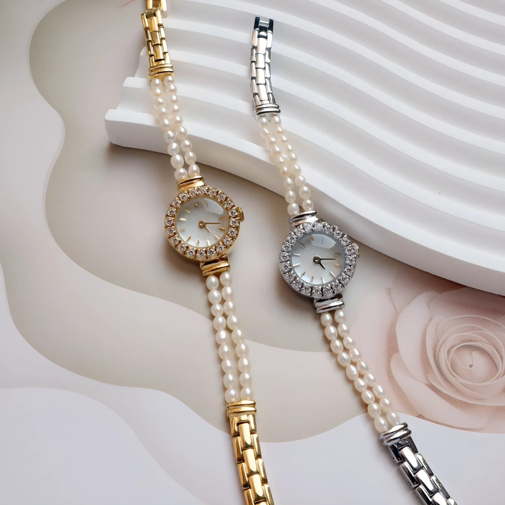 Women's light gold freshwater pearl bracelet watch with round dial on stainless steel strap