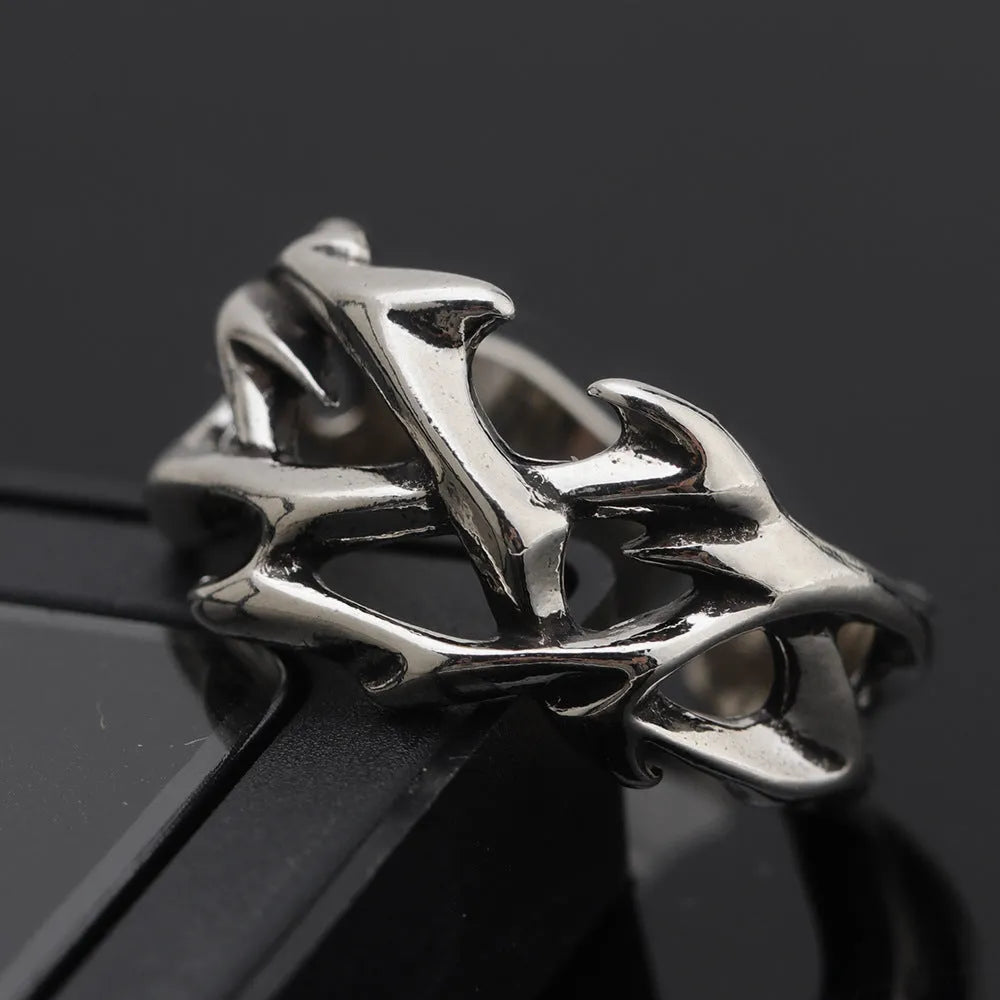 Copper men's ring with geometric thorn flower design and adjustable band in J2150 colour.