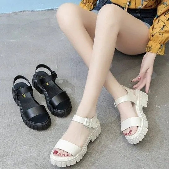 Beige women's peep toe platform sandals with an ankle-strap buckle on a white background.