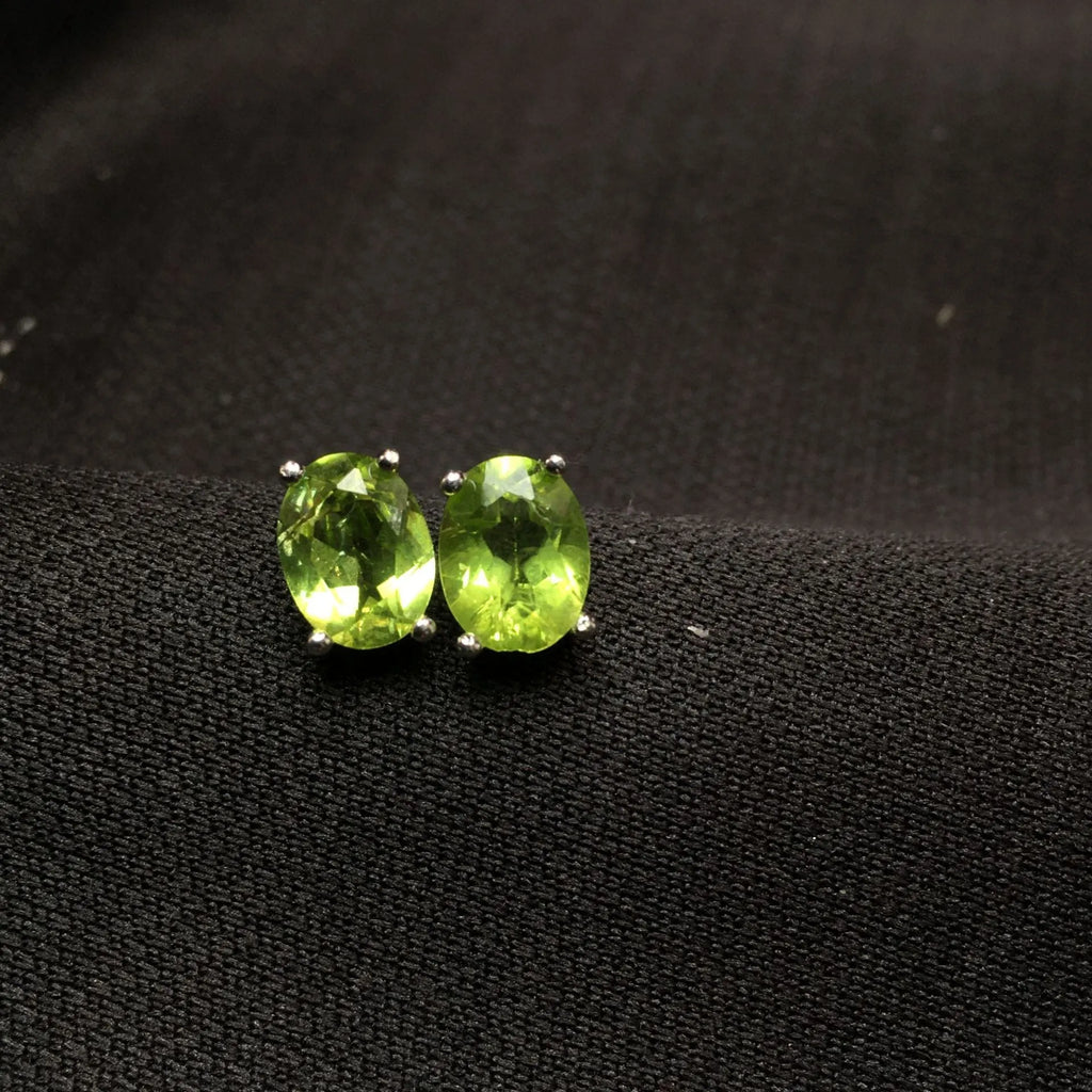 Natural olivine stud earrings with 6x8mm grass green faceted gemstone in S925 sterling silver