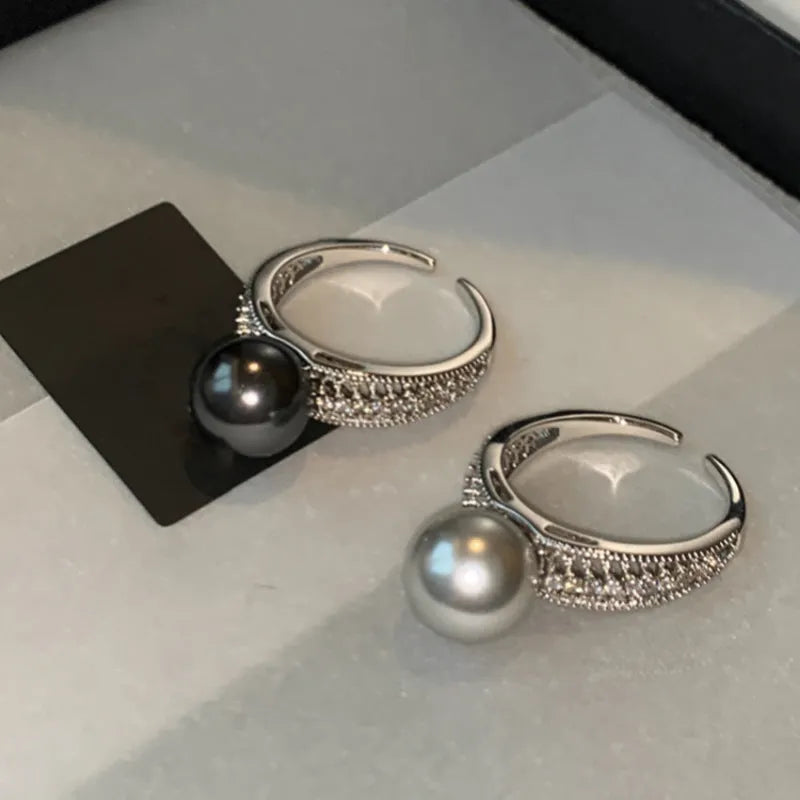 Adjustable copper finger ring with geometric black pearl design, open index construction