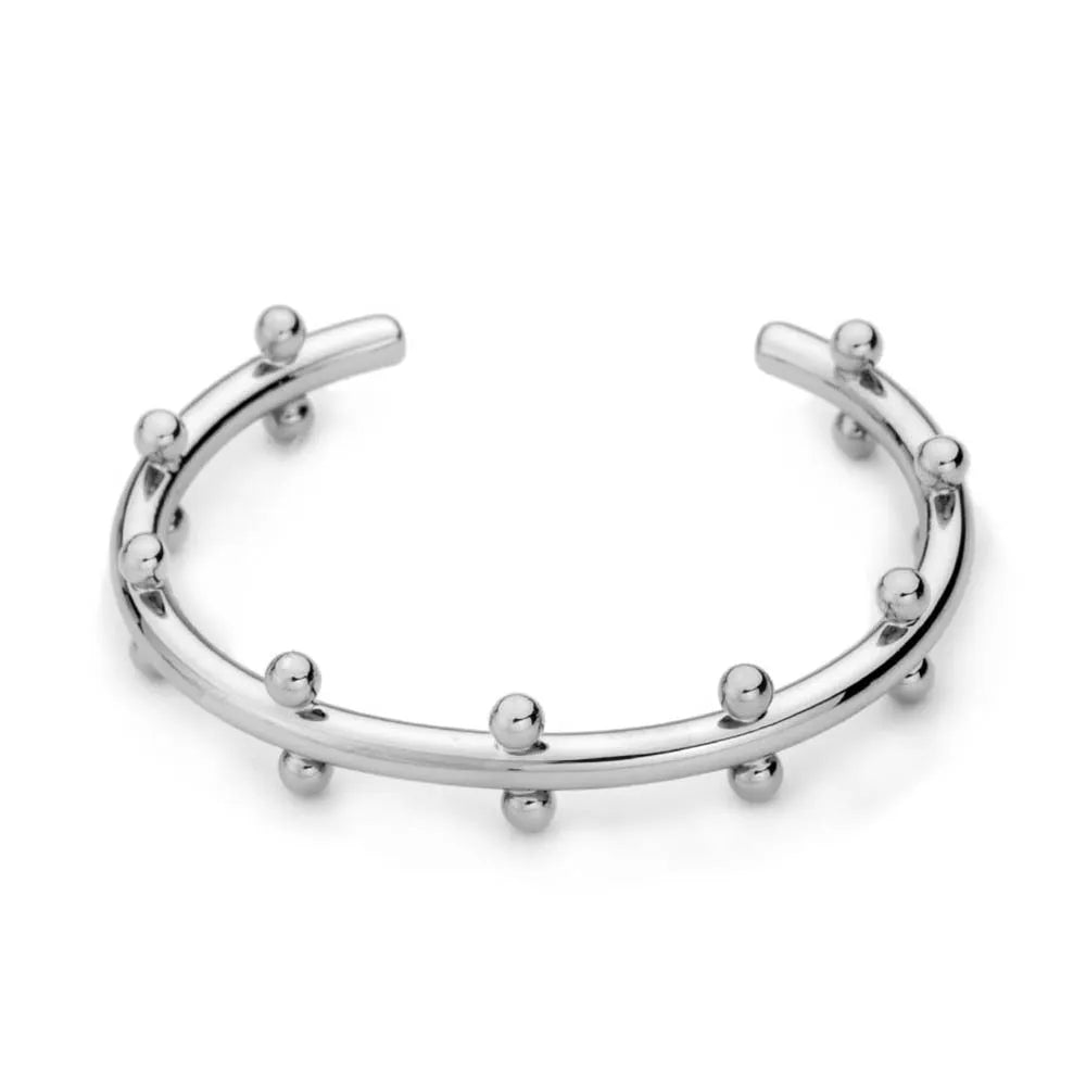 Stainless steel C-shaped charm with textured rivet bean beads on a round alloy bracelet.