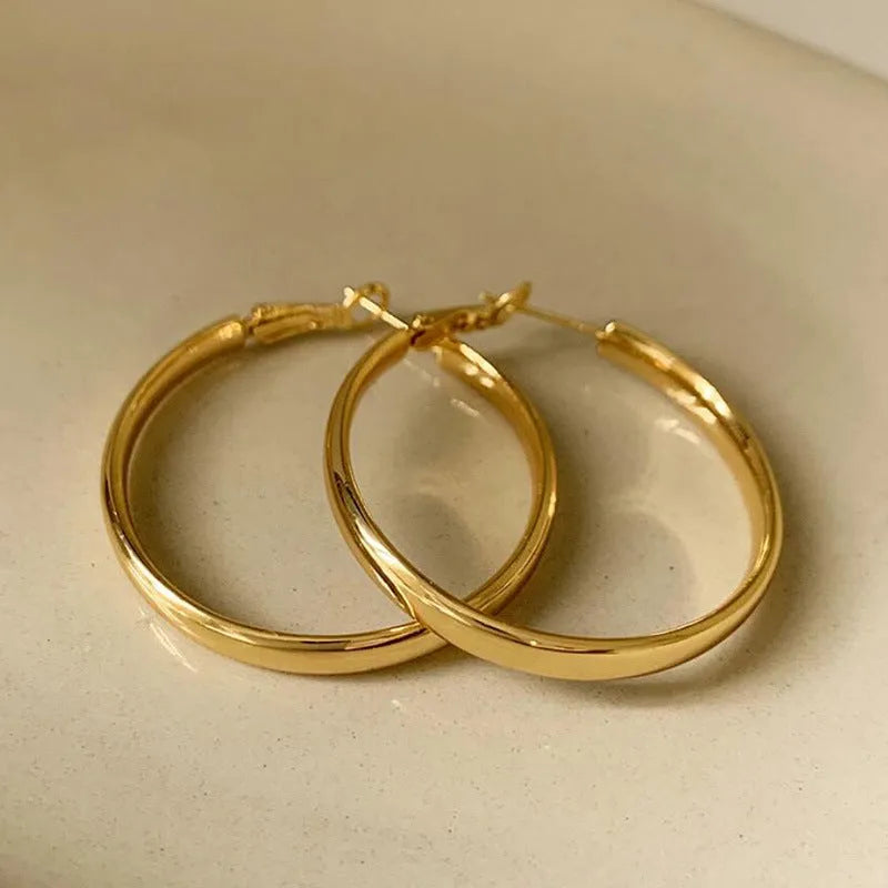 Gold and silver 40mm diameter electroplated copper circle earrings