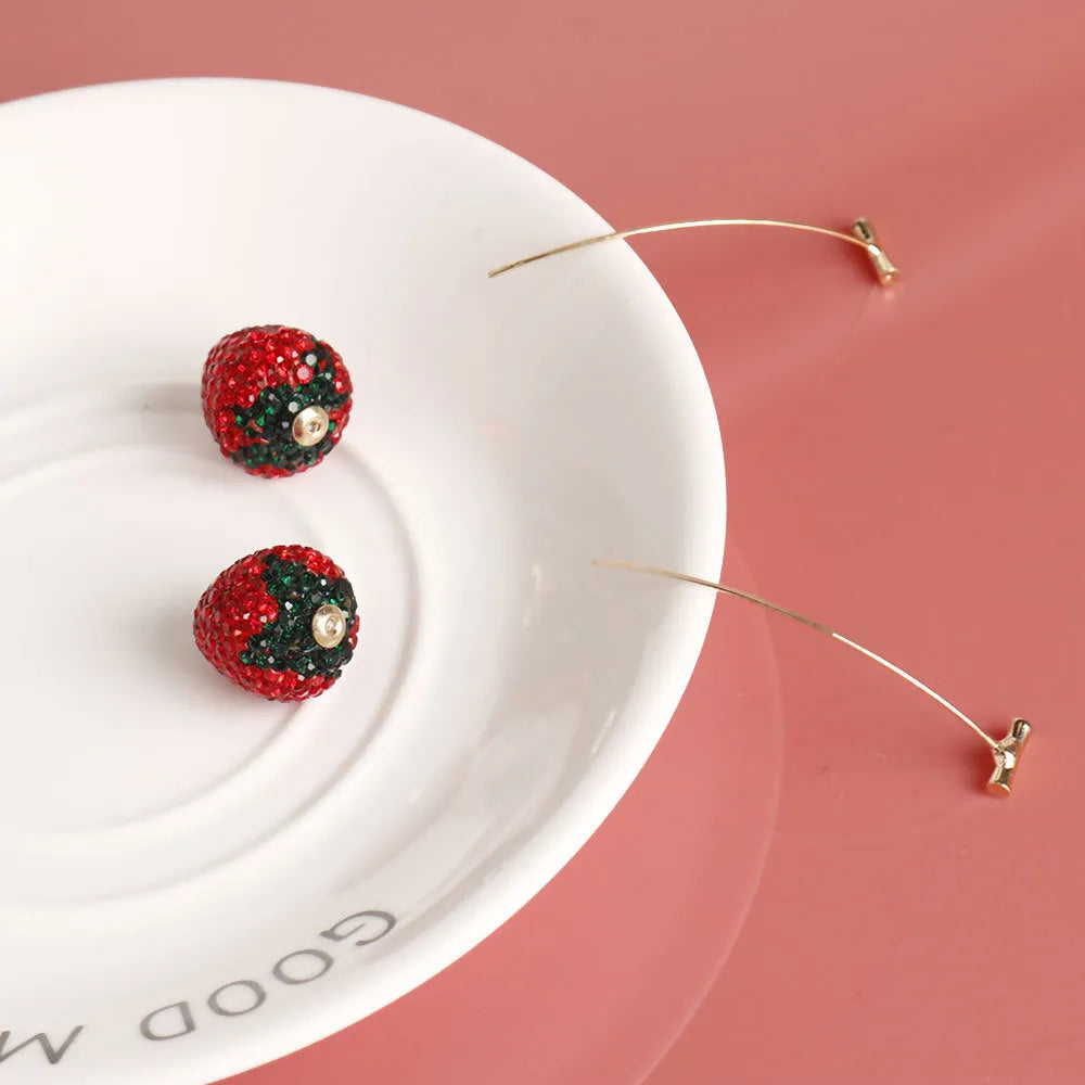 Geometric strawberry drop earrings for women in red zinc alloy with spot drill detail.