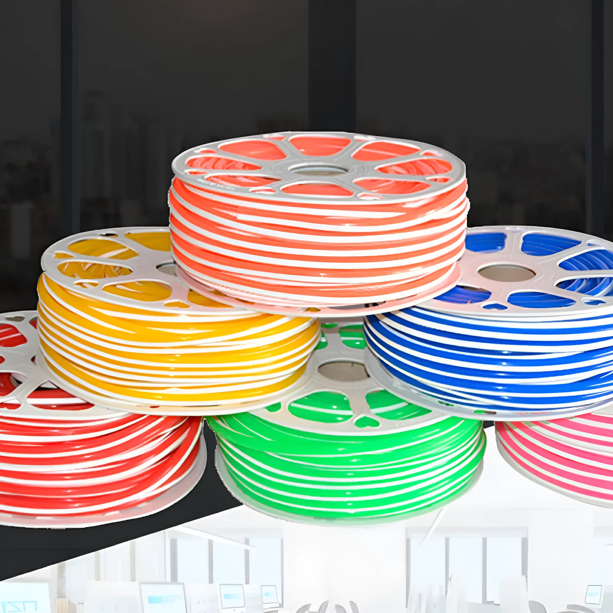 A roll of flexible blue silicone LED neon light bar, showing its 8mm width and coiled 50m length.