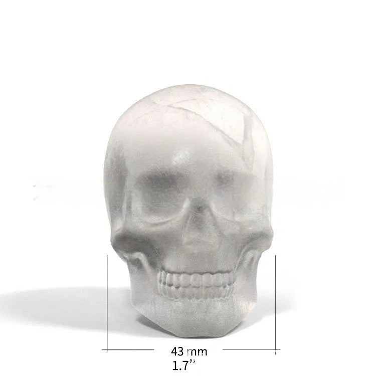 3D Halloween skull ice cube tray made from food-grade silicone, showing detailed skull cavities.