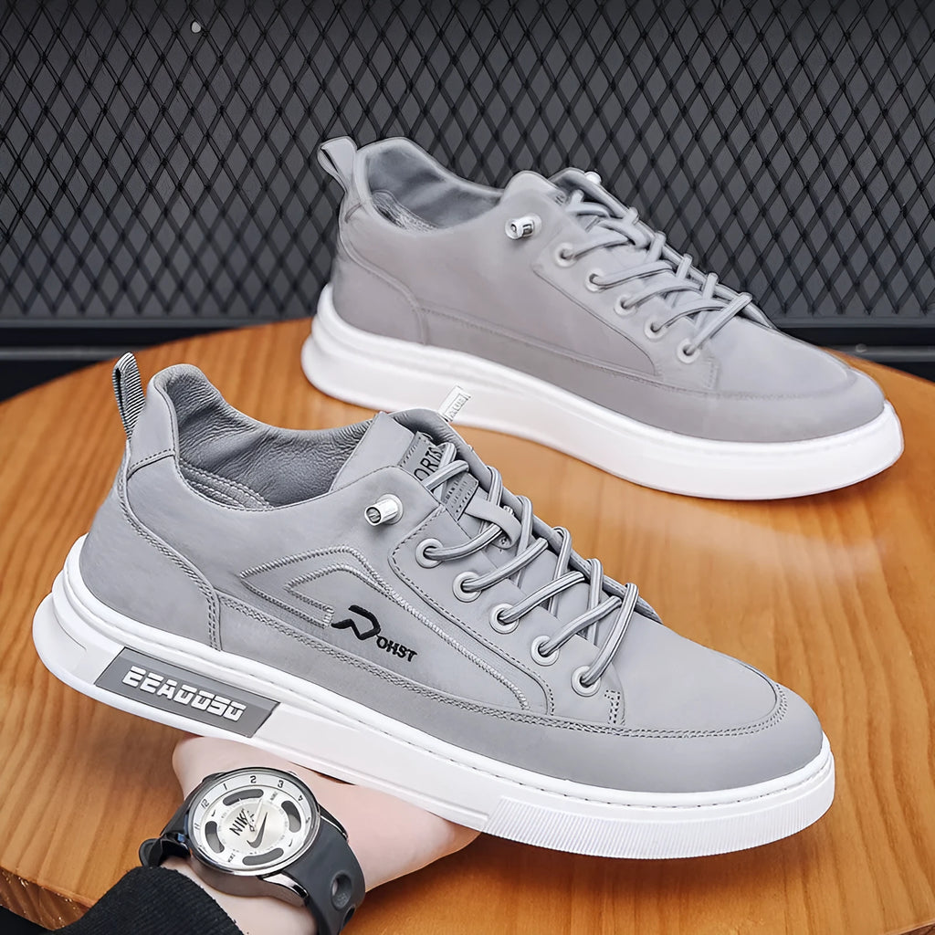 Grey men's canvas sneakers with round toe and lace-up design