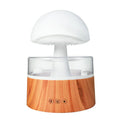 White cloud-shaped humidifier and aroma diffuser with coloured lights and simulated raindrops