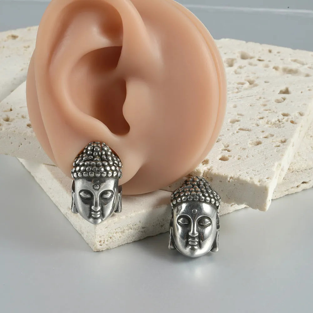Stainless steel hollow skull Buddha earrings in four electroplated colour options
