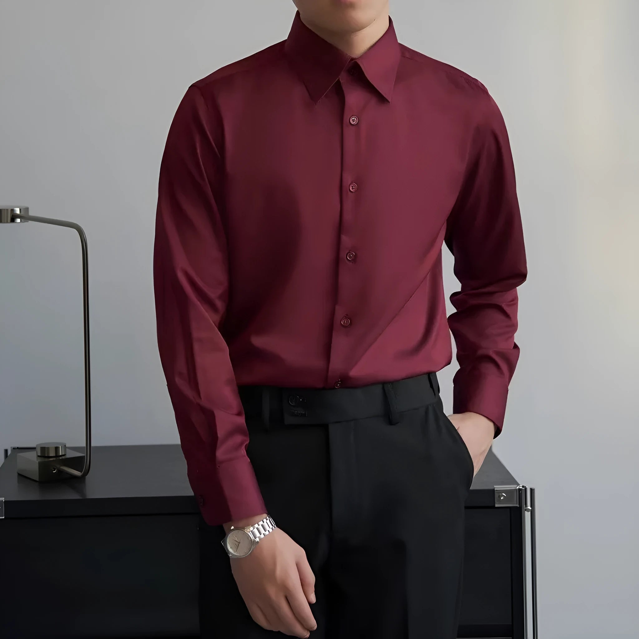 Men's black long sleeve Korean style cardigan shirt with slim fit and loose cut on a model.