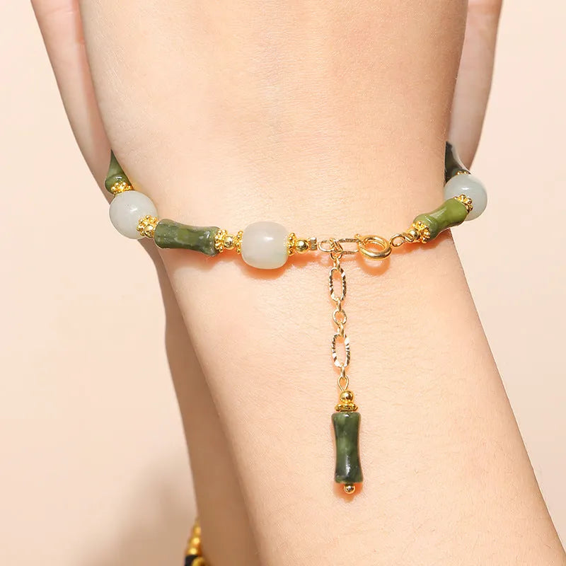 Close-up of a handmade girls' bracelet with crystal, agate and jade beads in a choice of colours and shapes.