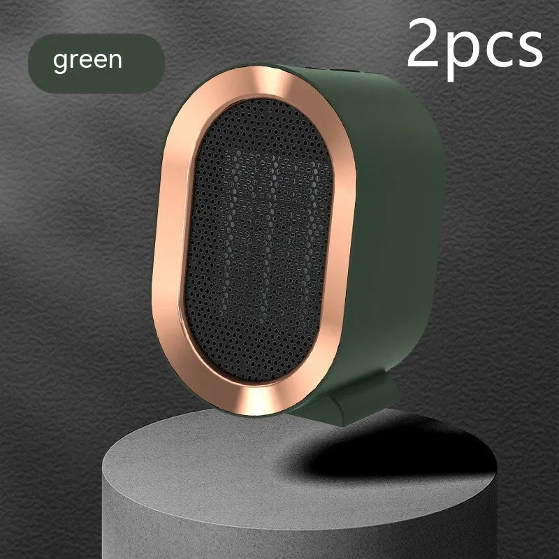 Mini portable electric heater with PTC ceramic heating and mechanical controls available in black blue green and white