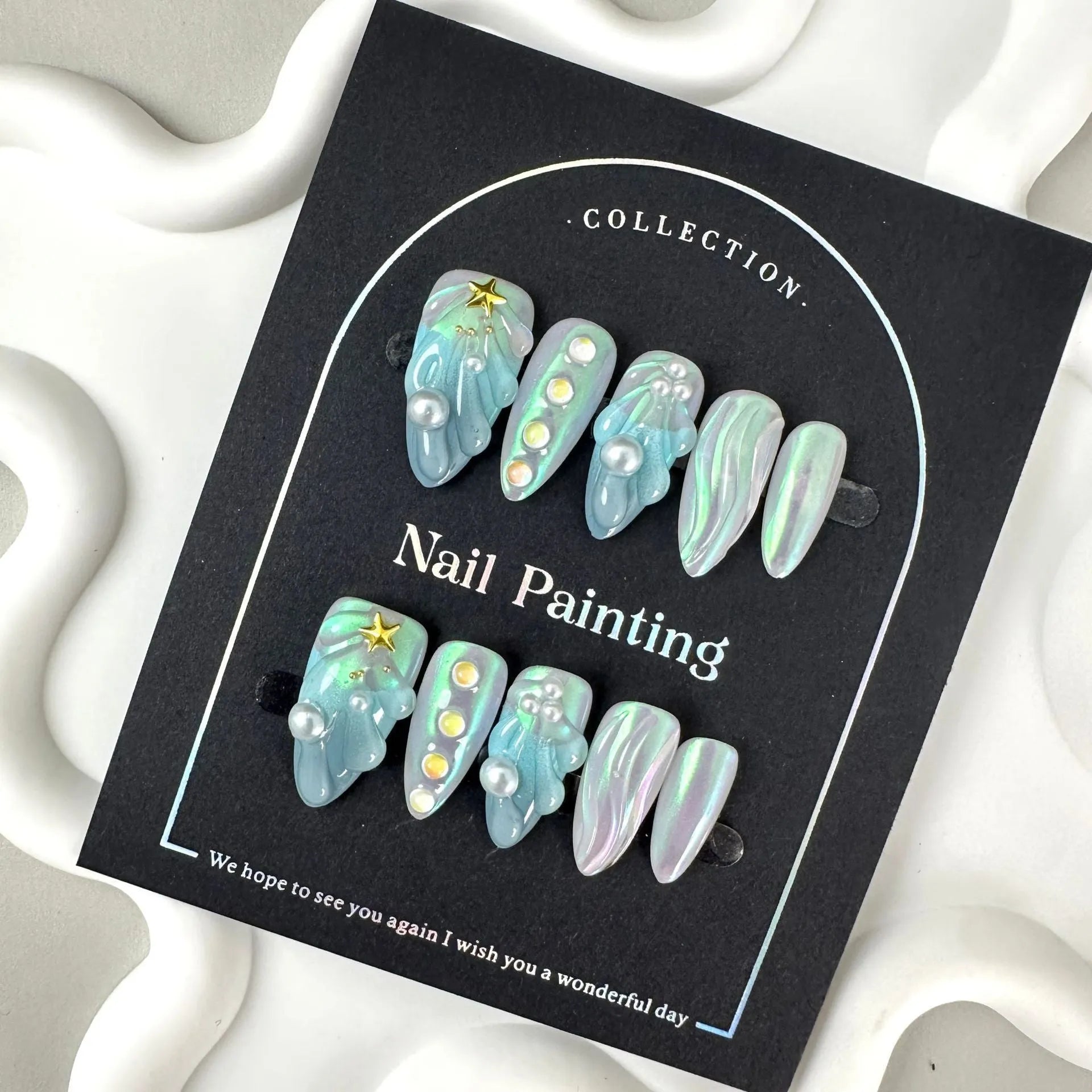 Blue plastic wearable nail armour set in sizes XS, S, M, L for ladies' nail decoration