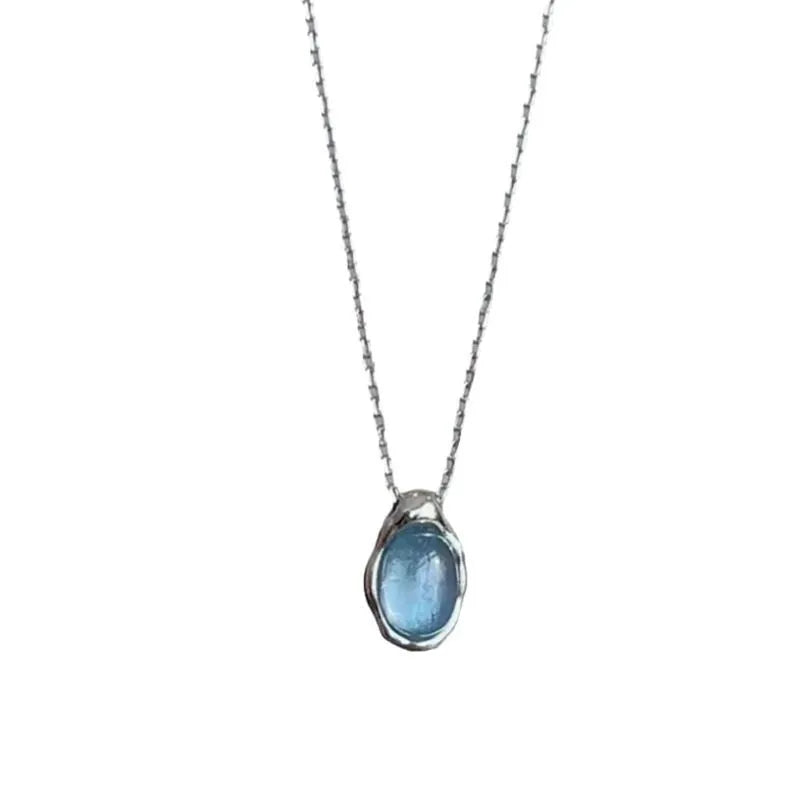 Navy blue geometric water drop necklace with adjustable chain and cross chain design