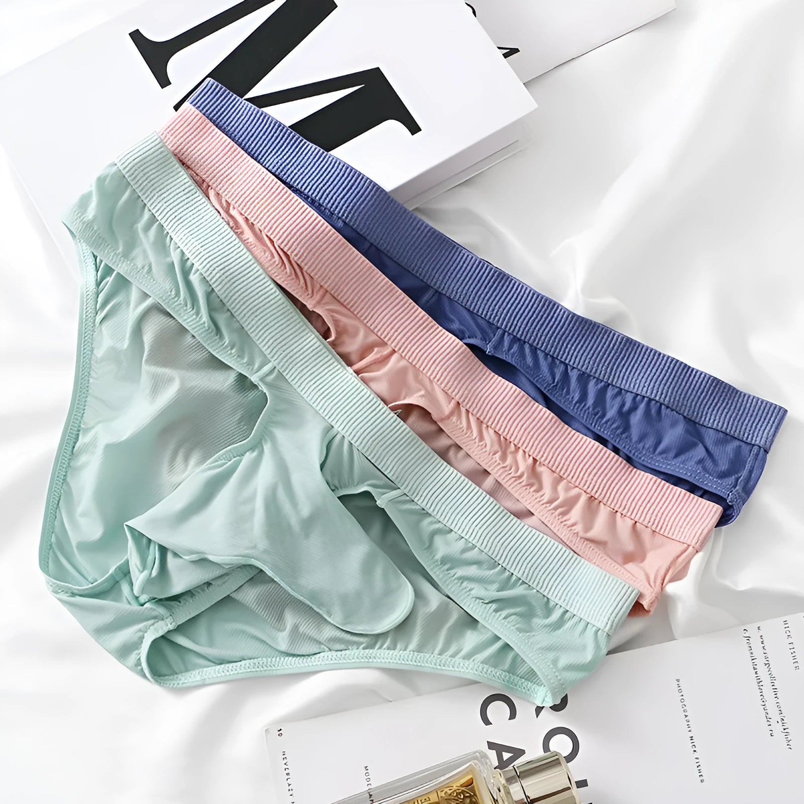 Men's Ice Silk low waist briefs in multiple colours showing lightweight nylon fabric construction