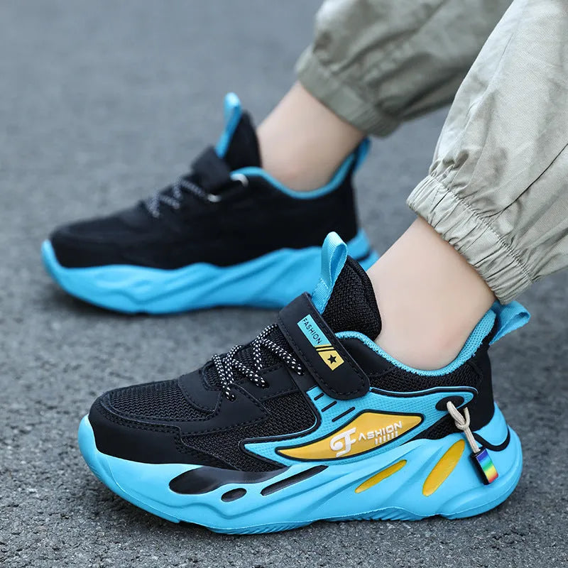 Boys' dark blue and black platform sports shoes with Velcro strap and mesh upper.