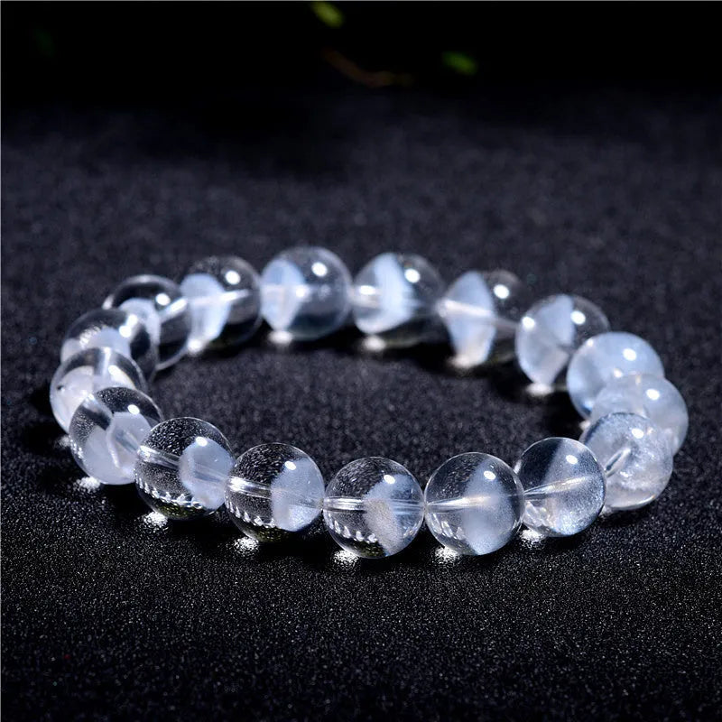 Women's white crystal ghost pyramid bracelet with Ruyi charm in graduated sizes