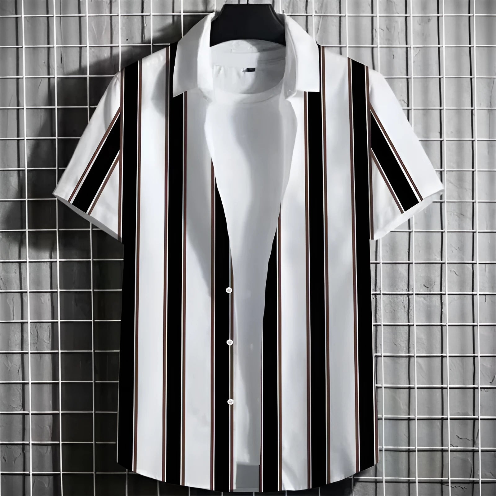 Man wearing a striped linen short-sleeve T-shirt with a 3D printed pattern.