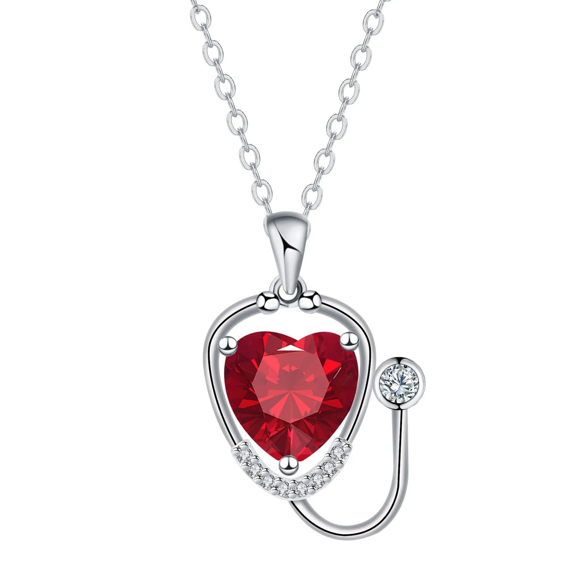 Women's fashion necklace with a copper wings cross stethoscope pendant featuring red diamond detail.