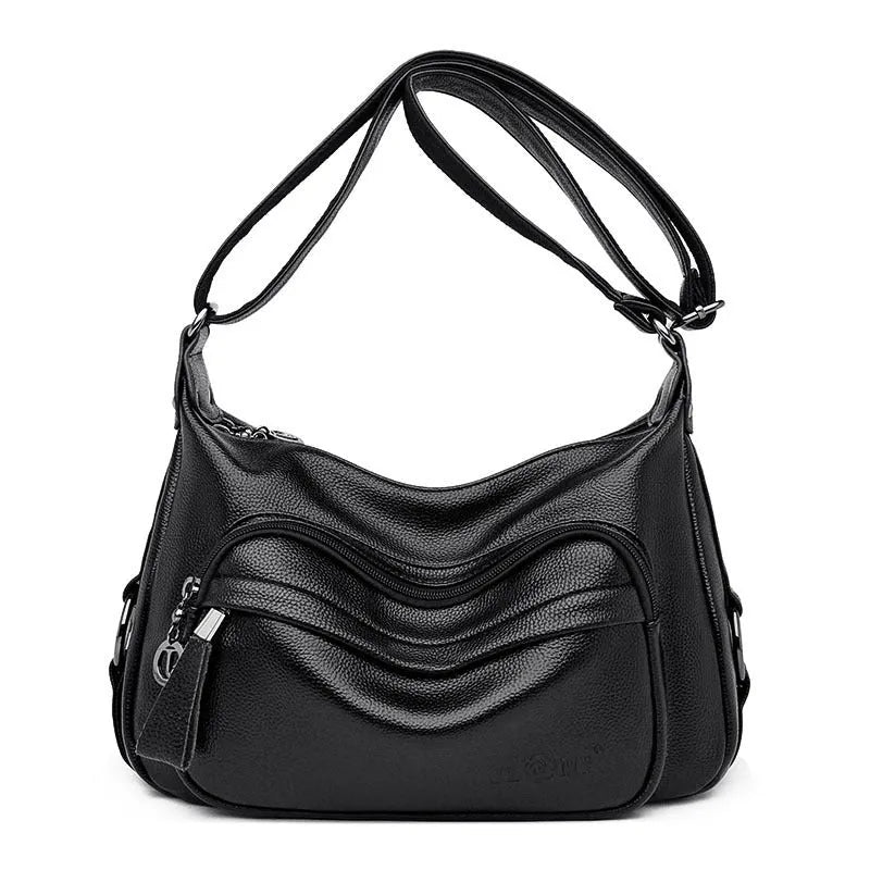 Large black or blue soft PU women's shoulder bag with crossbody strap and multiple internal pockets
