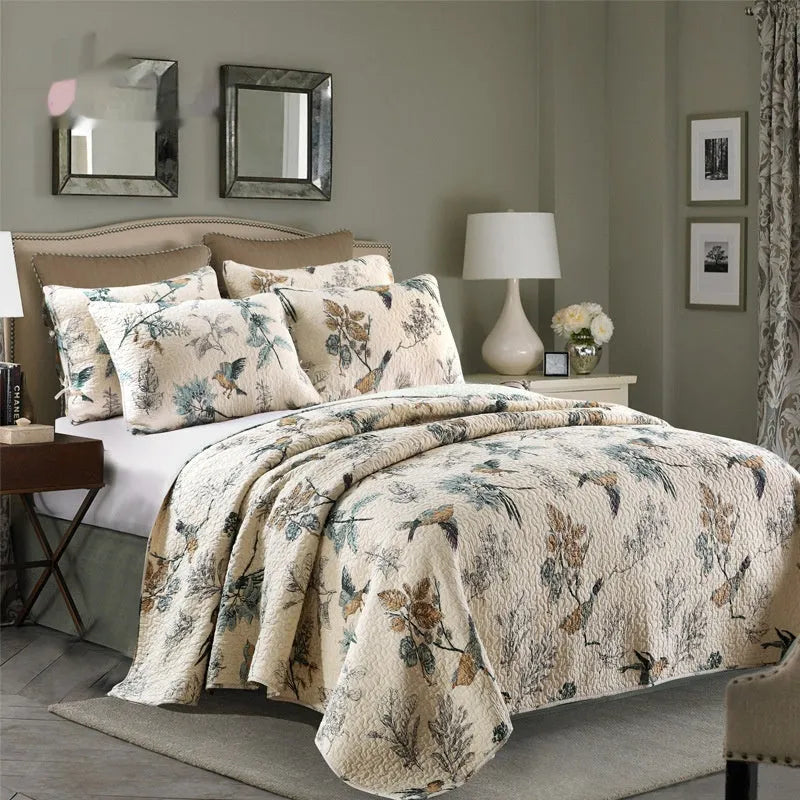 American style quilted cotton bed cover set with matching pillowcases on bed