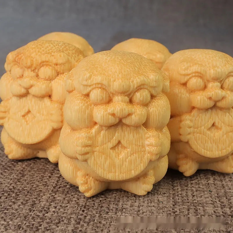 Solid bamboo carving ornament with take money design measuring 4.5cm height