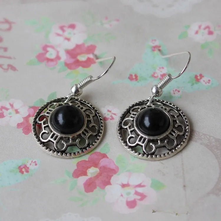 Handmade geometric Miao silver earrings with turquoise stones and ethnic patterns in three colour options