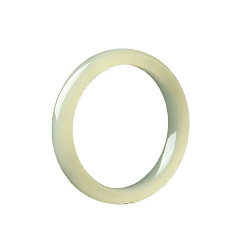 Round bar jade bracelet with geometric winding silk jade design, shown in a listed inner diameter size