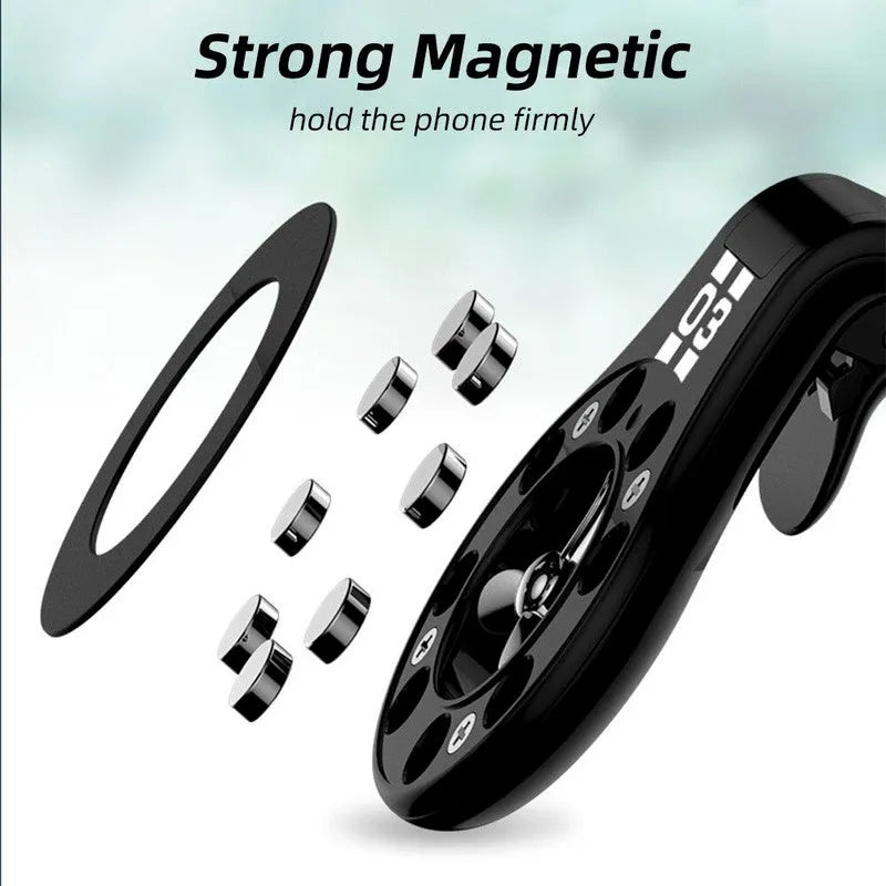 Black magnetic car phone holder attached to a car air vent, holding a smartphone at an angle.