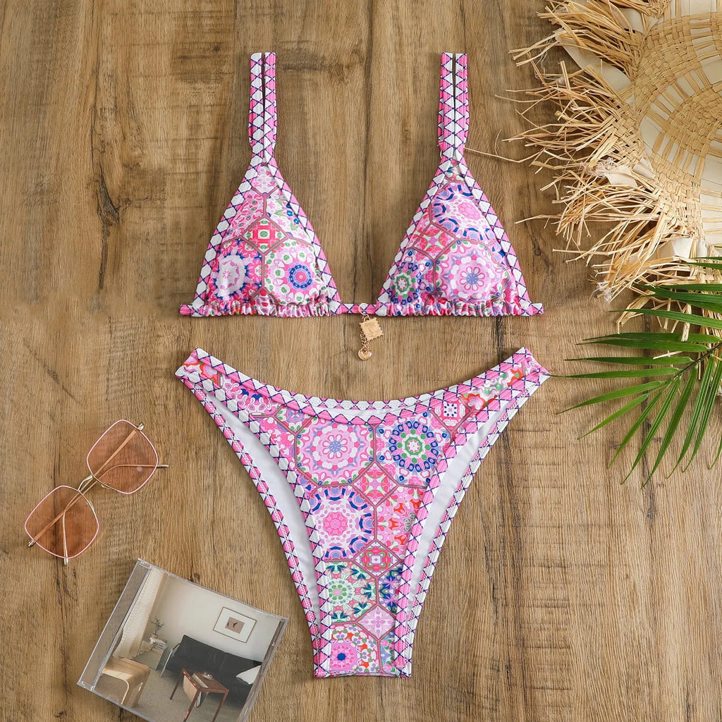 Retro patterned women's bikini in orange, pink, black, and blue colours with polyester fabric