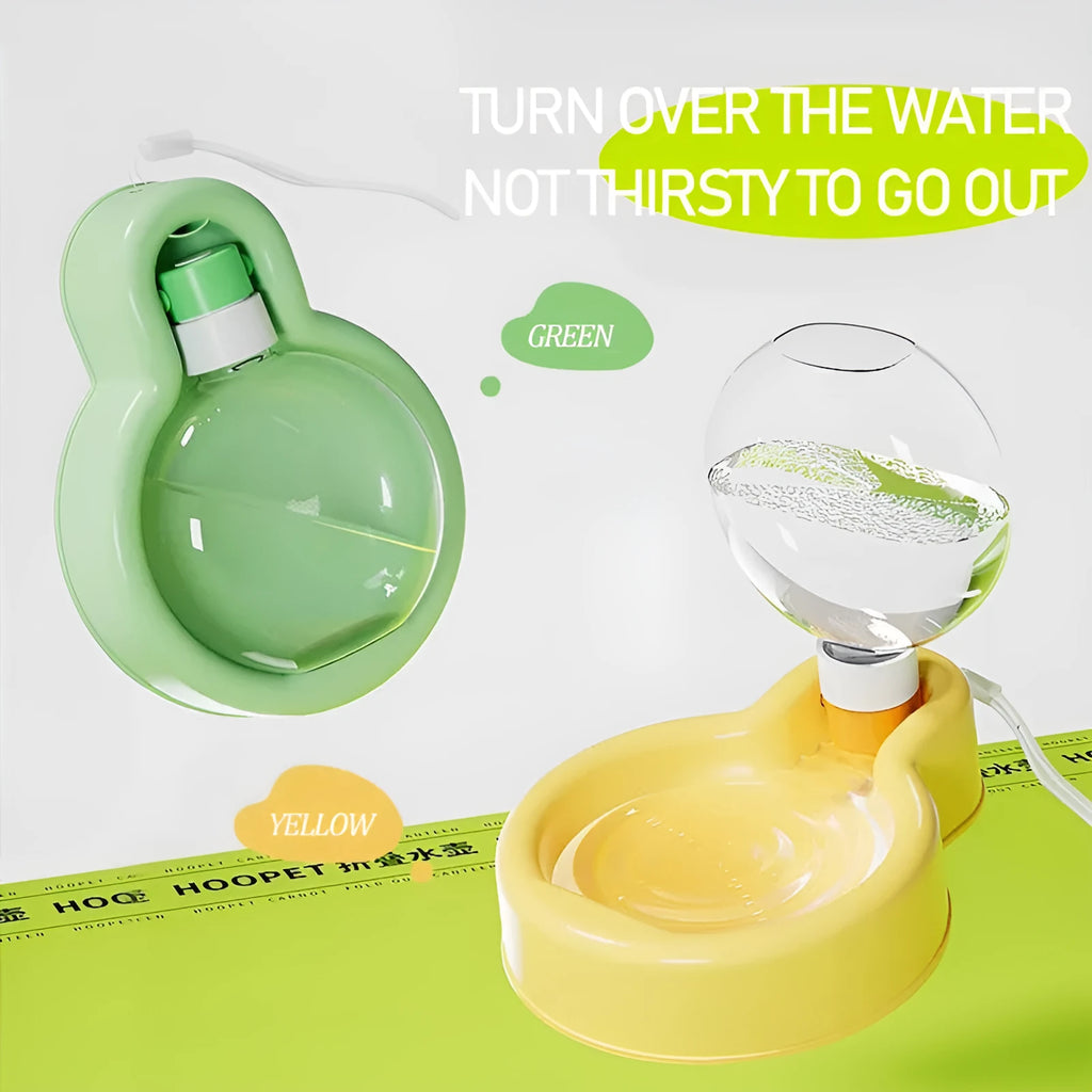 Green dog travel water bottle with pull-out drinking bowl for outdoor use