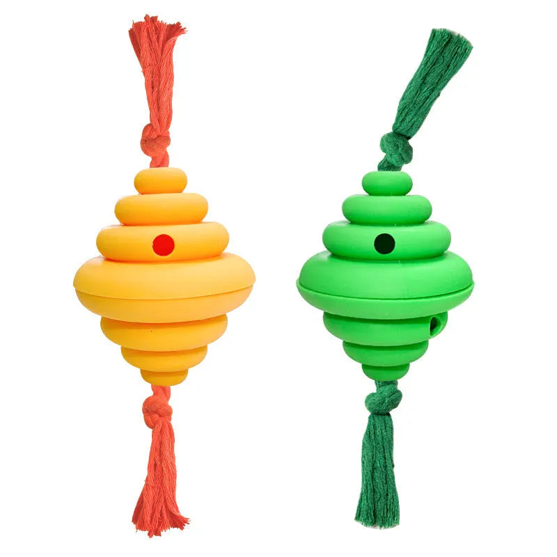 Large green and yellow dog ball with rope attachment for interactive play and treat dispensing