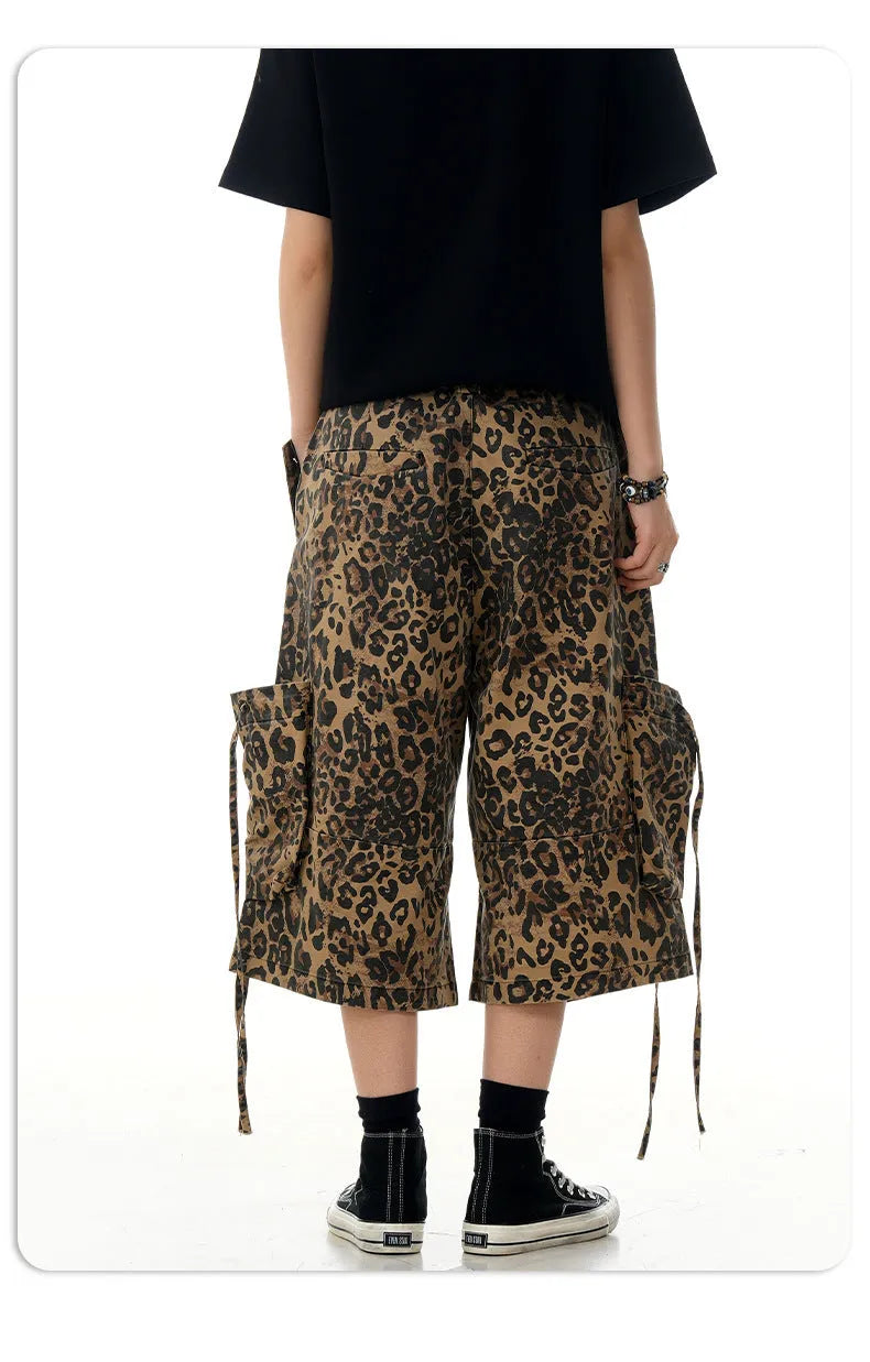 Leopard print women's trousers with high waist, button fly, and cropped straight-leg design