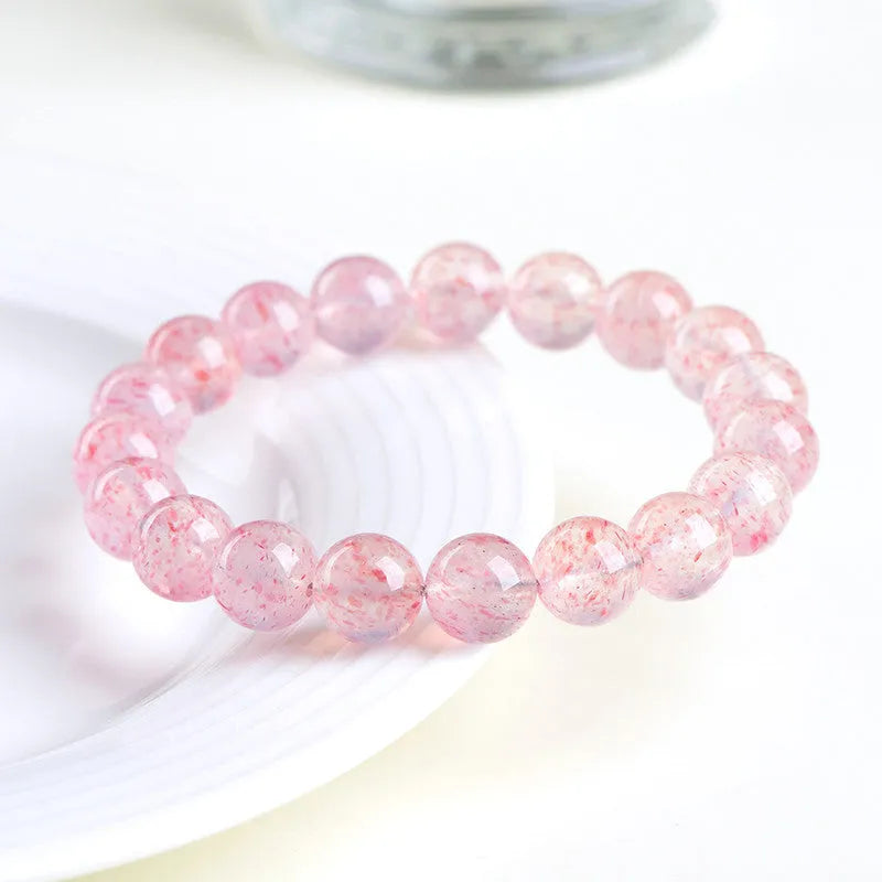 Strawberry quartz crystal ball bracelet with natural white water body colour and geometry beads