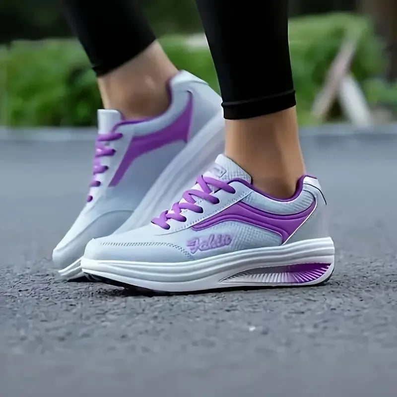 Women's mid-heel travel sports shoes in black colour with heelless design