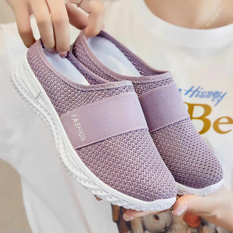 Women's breathable mesh casual shoes with hollow-out detailing in black, grey, pink, or purple colours