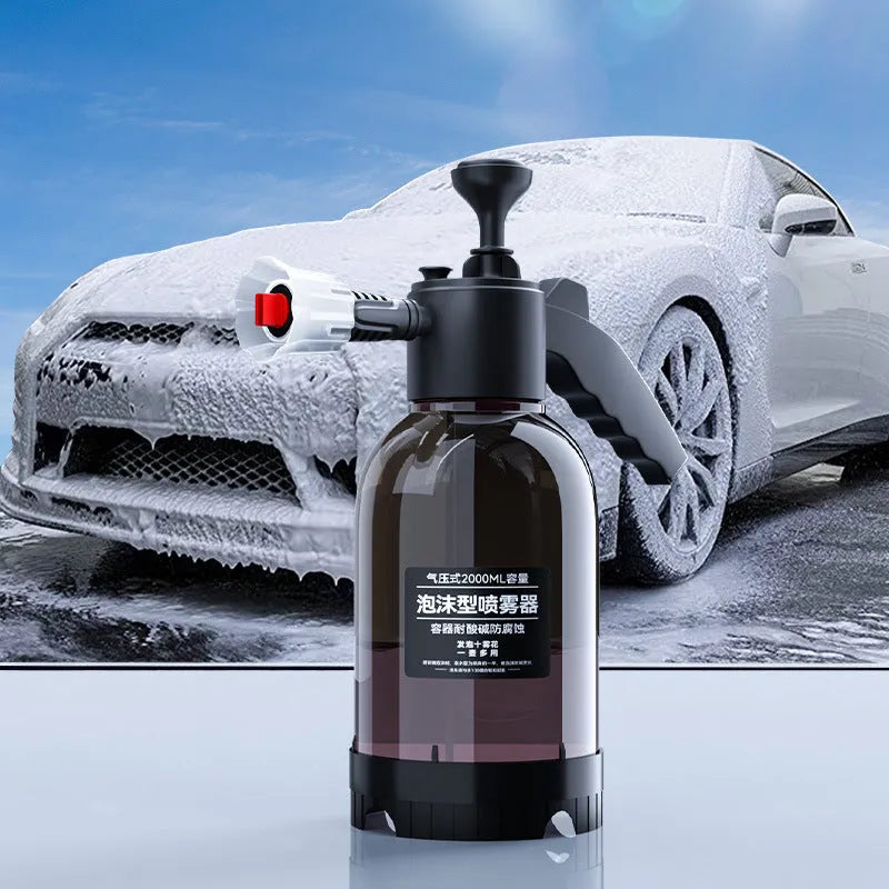 Black 2L plastic foam watering can sprayer with pump handle and two nozzles for car washing and gardening.