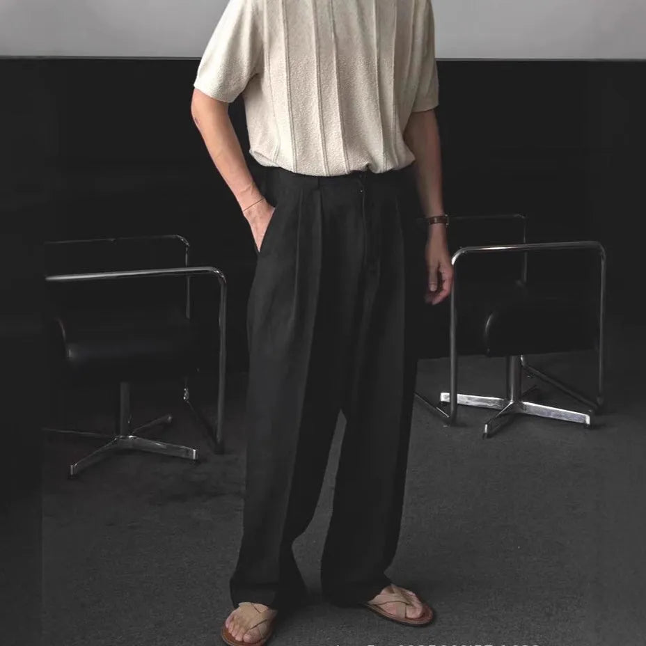 Men's apricot-coloured wide-leg cotton linen blend trousers with a mid waist and pencil pant cut.