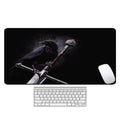 Large natural rubber mouse pad with thermal transfer pattern on desk showing non-slip base and multiple size options