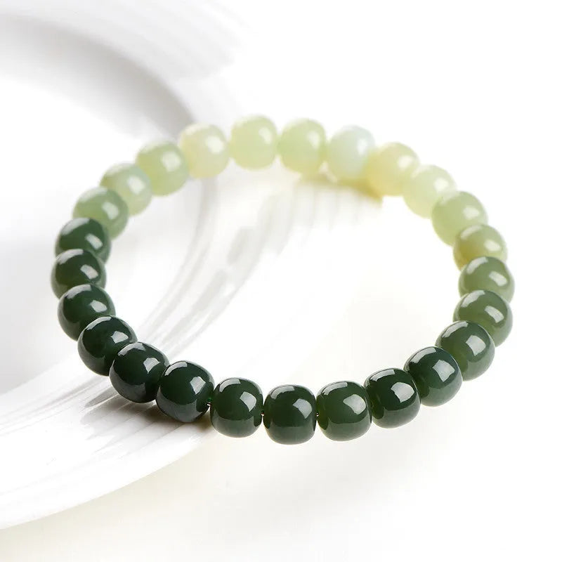 Natural Hetian jade bracelet with water gradient colour beads in two size options.