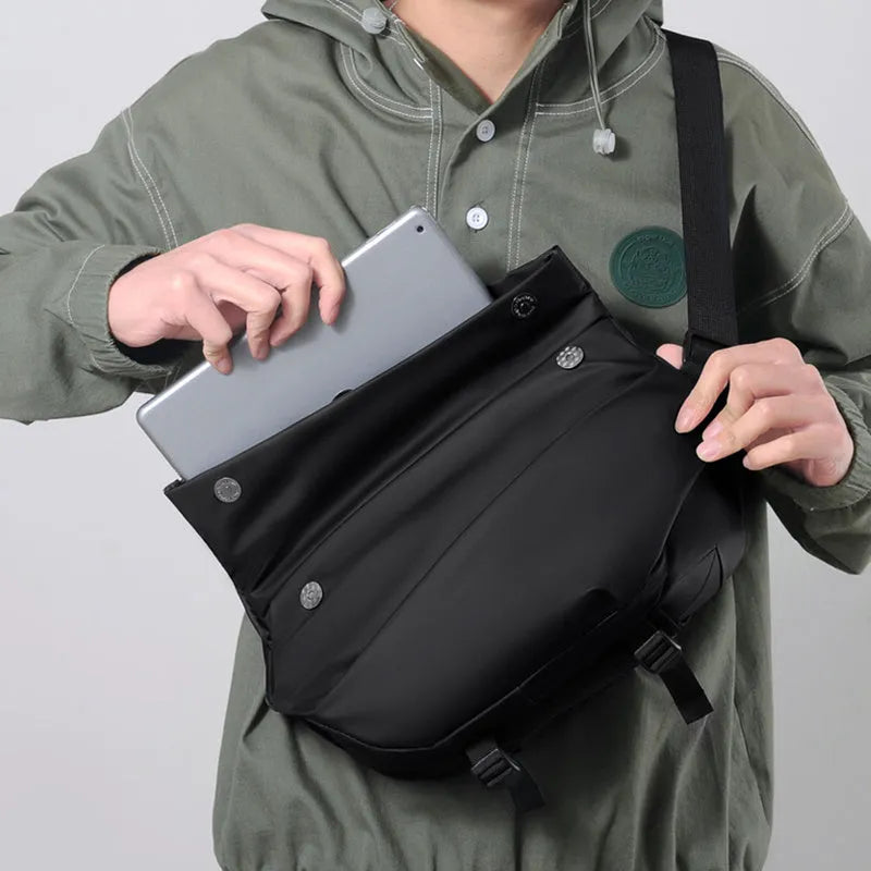 Men's grey PU crossbody bag with shoulder strap showing internal organisation compartments
