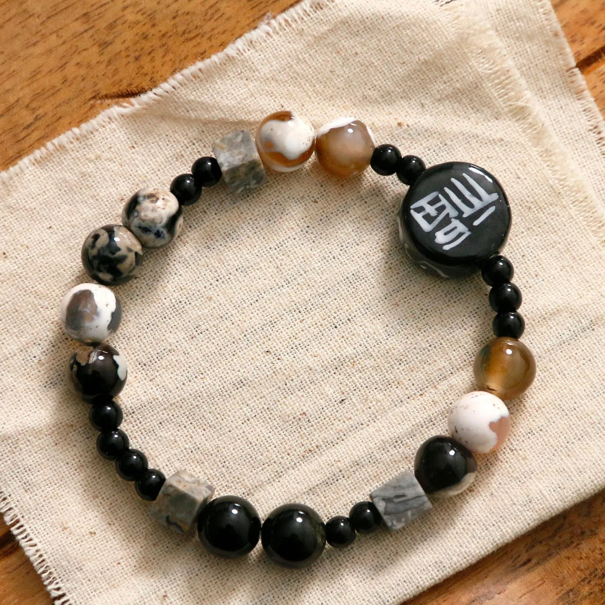 Hand-woven black agate ceramic bracelet with natural stone geometric round beads, unisex design
