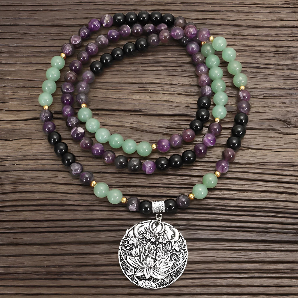 Handmade stone bead yoga necklace with geometric alloy lotus pendant and matching bracelet.