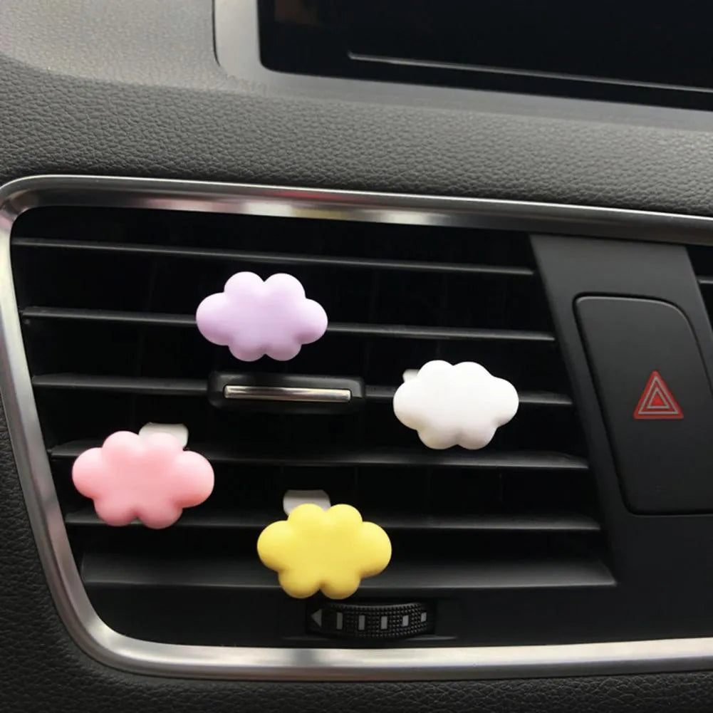 Resin cartoon Baiyun design car air vent fragrance clip in light green colour.