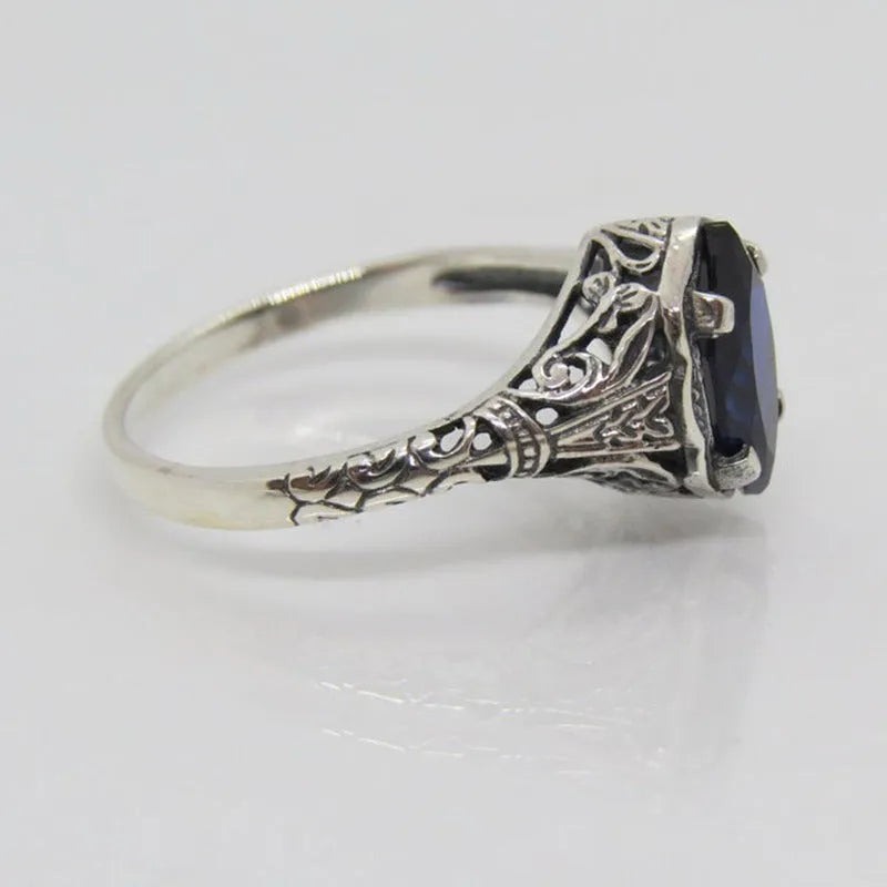 Silver geometric hollow women's ring in alloy with multiple size options